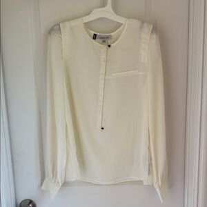 Jennifer Lopez Cream Blouse with Black Buttons